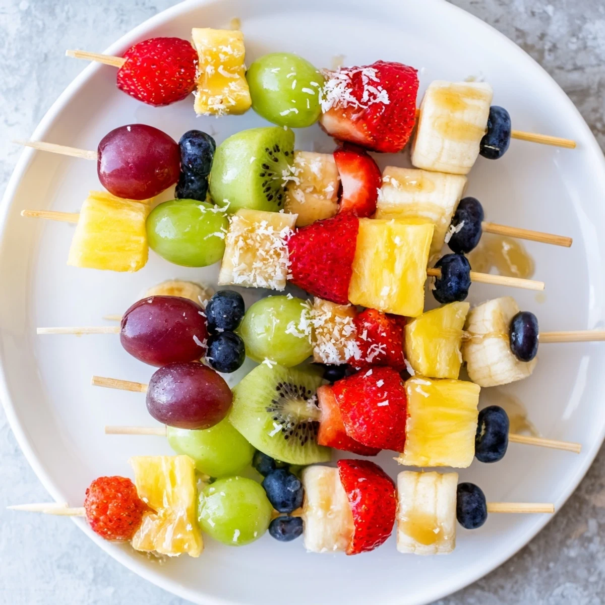 Skewers bursting with sweetness: Easy Festive Fruit Kabobs offer a delightful rainbow of flavors and textures.