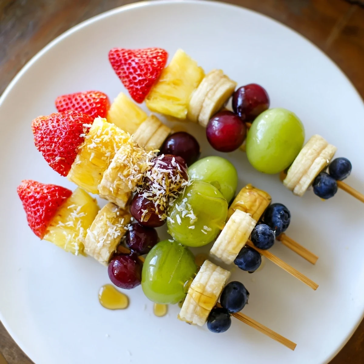 Vibrant, colorful Easy Festive Fruit Kabobs, perfect for a summer picnic featuring fresh, juicy fruit.