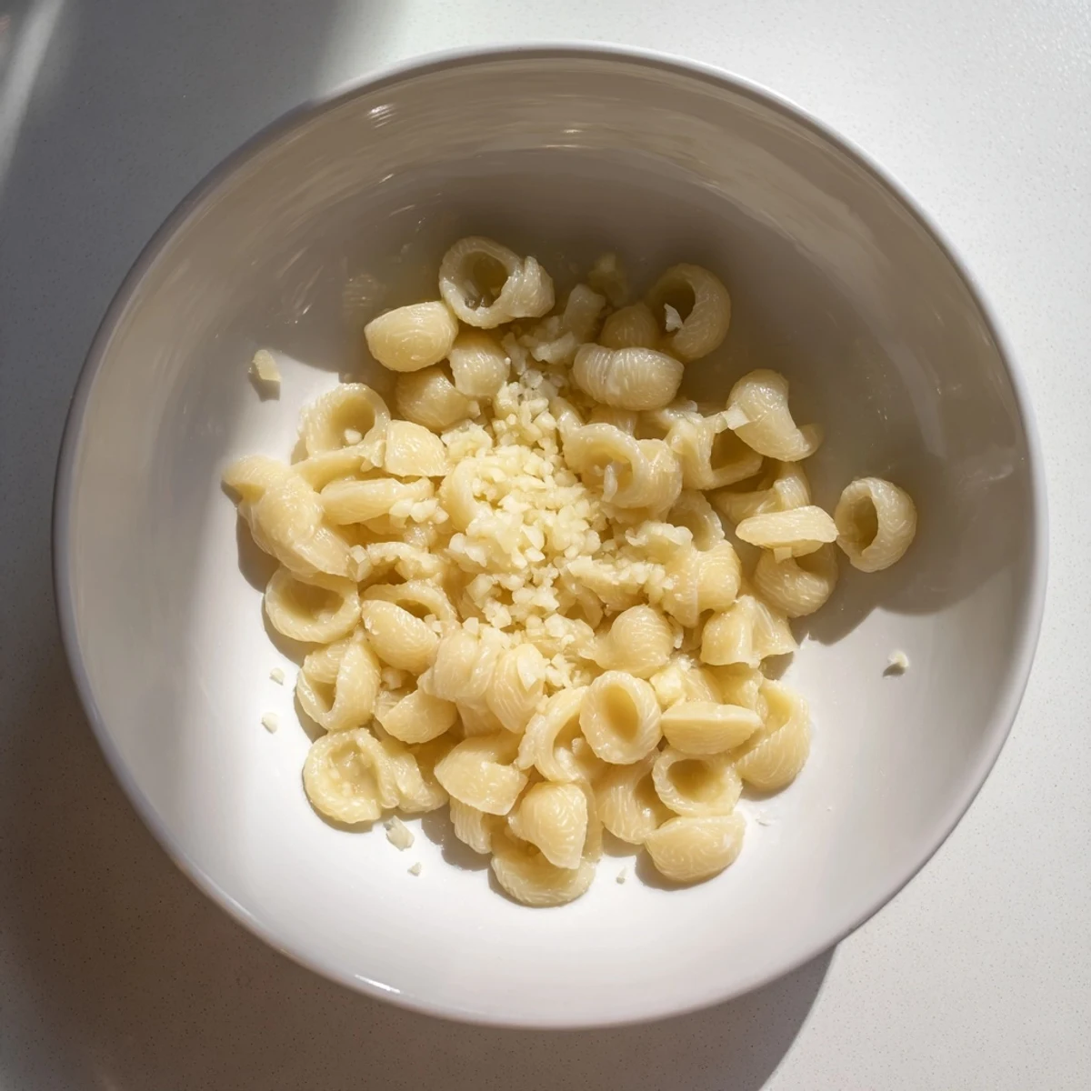 Savory close-up of 3-Ingredient Butter & Garlic Ditalini: creamy butter coats each pasta piece with garlic.