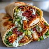 Savory Caesar chicken wraps with fresh romaine, a perfect portable meal.