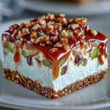 Bright apple Jello layered over creamy cheese and salty pretzel crust.