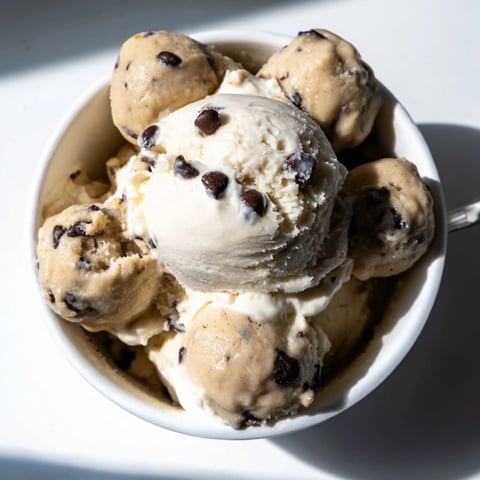 Creamy cottage cheese ice cream swirled with chocolate chip cookie dough bites.  