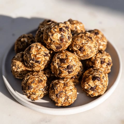 Chewy Almond-Chia Energy Bites with dark chocolate, perfect for a quick and wholesome snack.