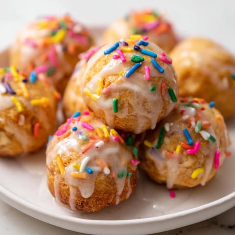 A close-up of freshly baked Quick Christmas Biscuit Bombs, offering a warm, cinnamon-spiced aroma.