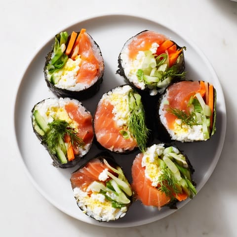 Close-up of a High-Protein Sushi Wrap Smoked Salmon Holiday Roll, showing colorful fillings and a perfect spiral.