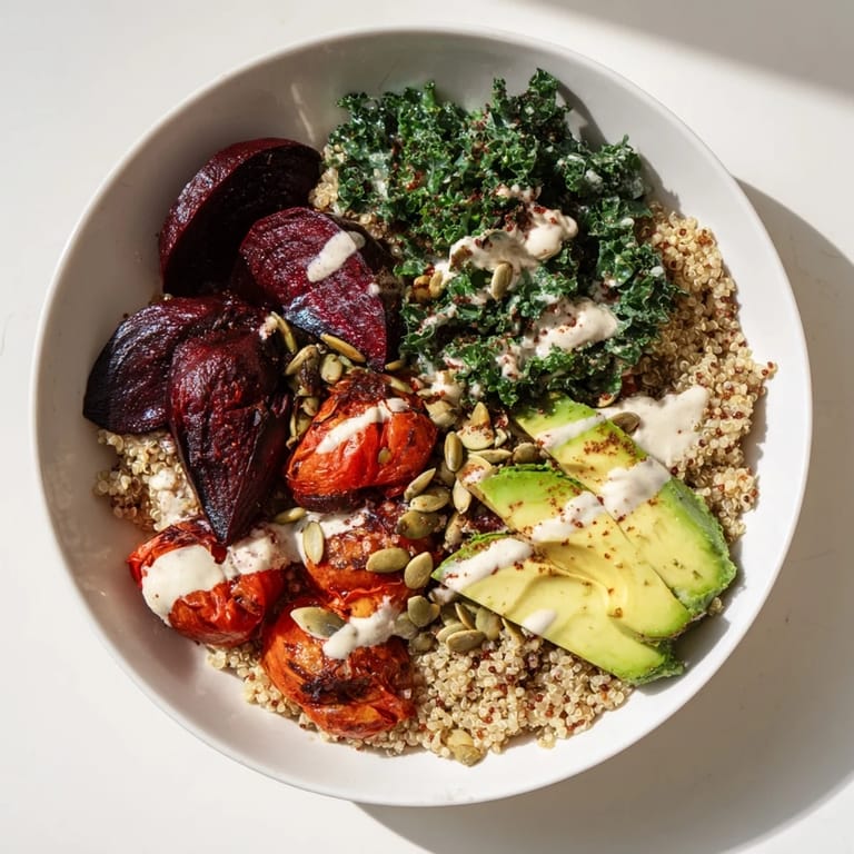 Imagine the flavors of this Quinoa, Kale & Roasted Beet Bowl: beets, kale, and creamy tahini, beautifully combined.